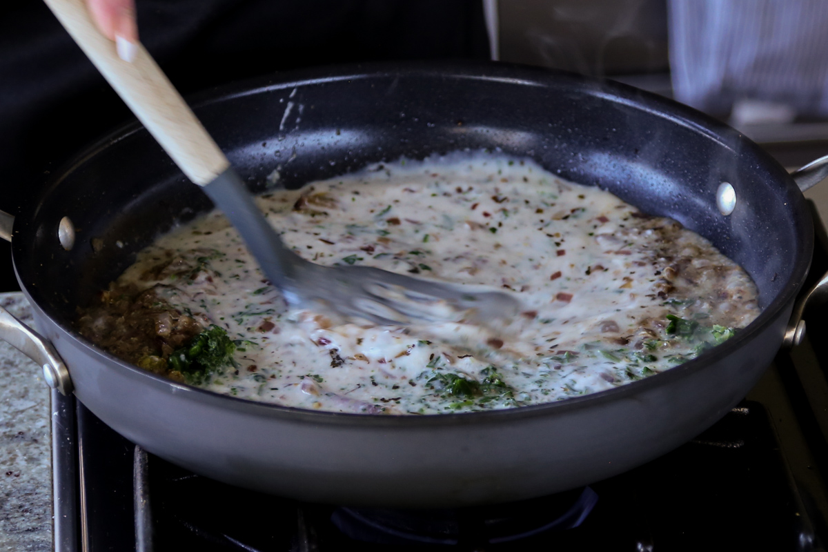 mixing the kali mirch sauce