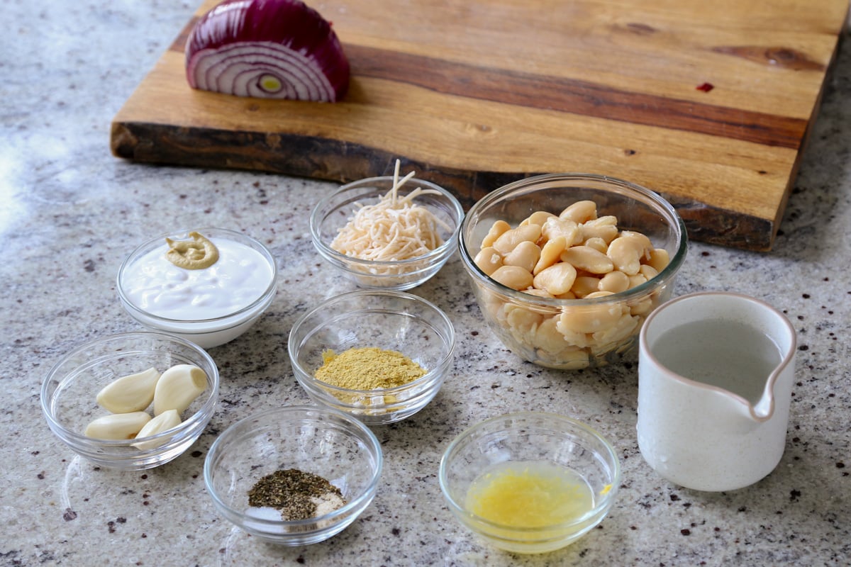 butter beans, garlic, and other ingredients on the kitchen counter