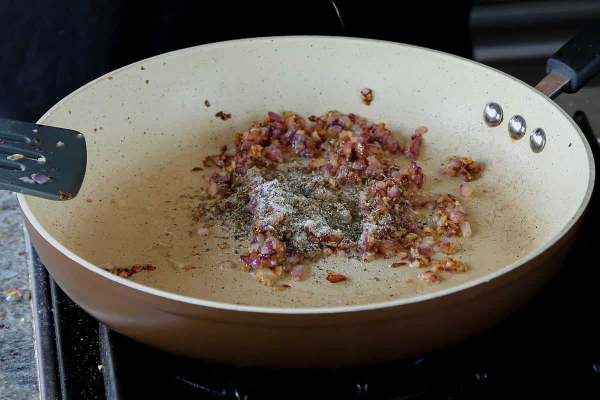 adding the dry spices to the pan