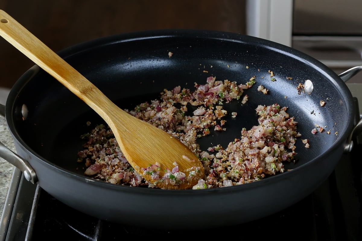 coconut, onion, and green chili after toasting in the pan