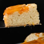 serving a slice of peach upside-down cake