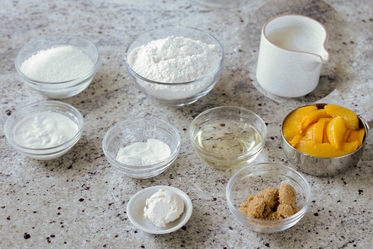 peach upside-down cake ingredients in bowls on the kitchen counter