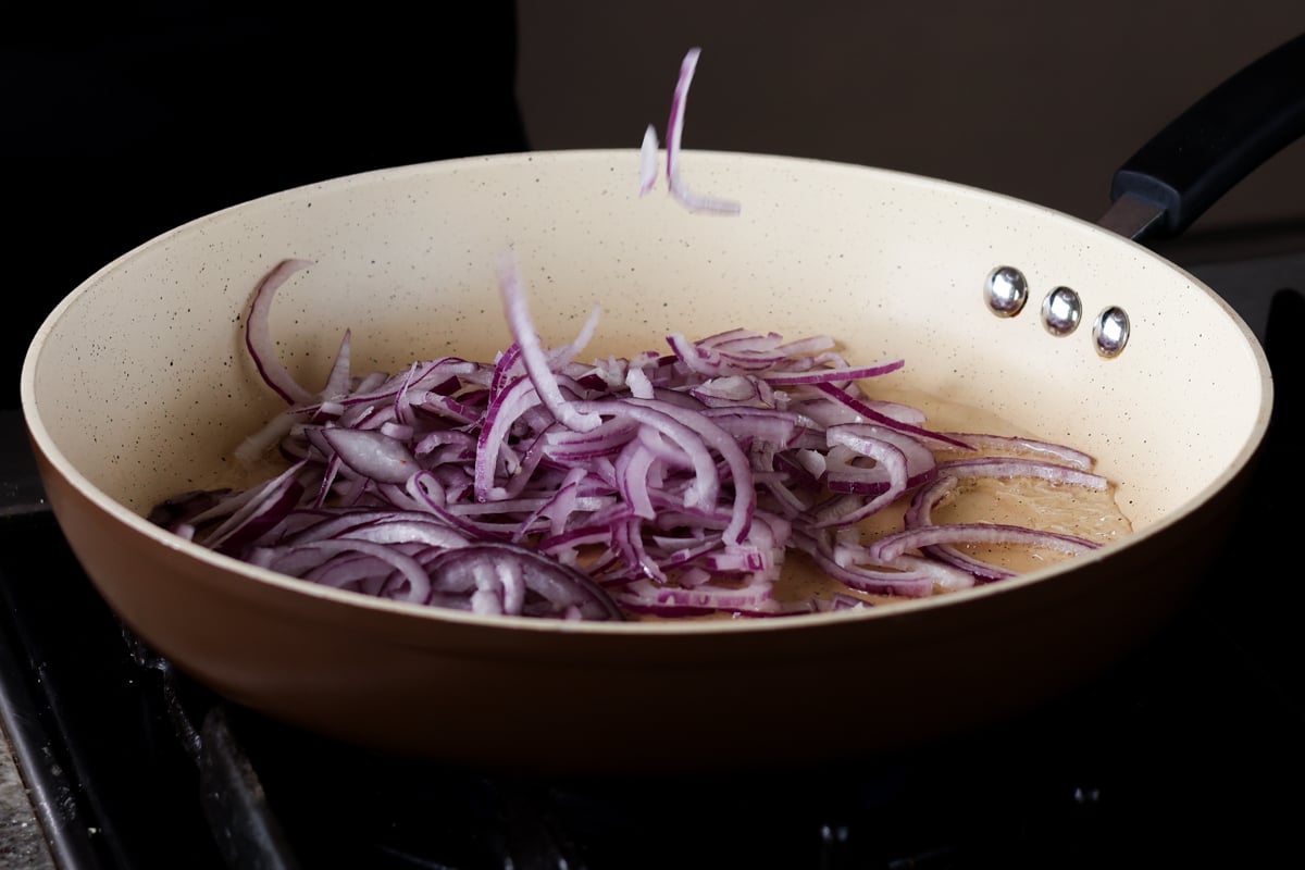 onions in the pan before cooking