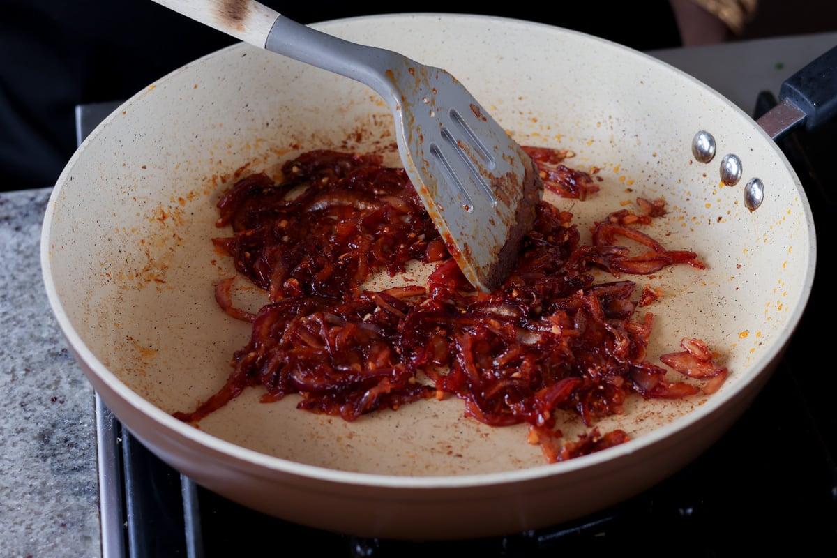 gochujang onions in the pan after cooking