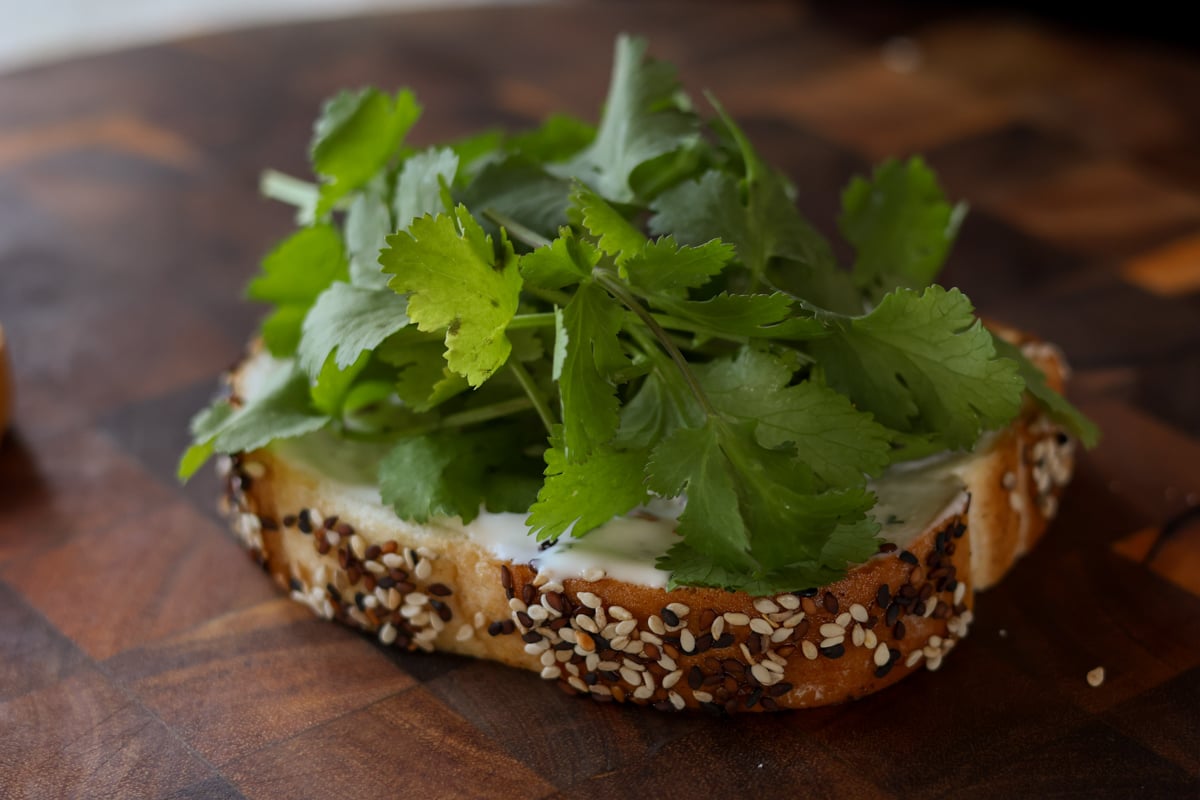 adding cilantro to the bread