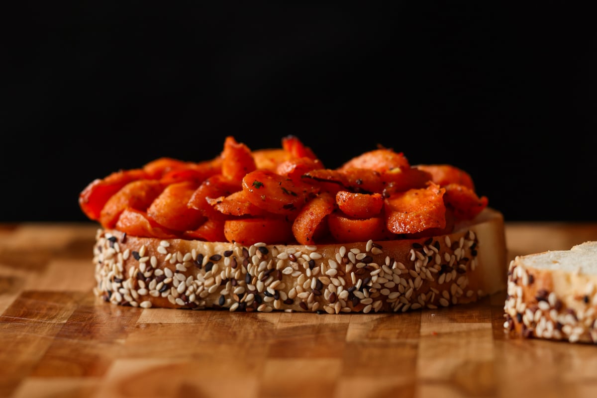 bread with roasted carrots on it