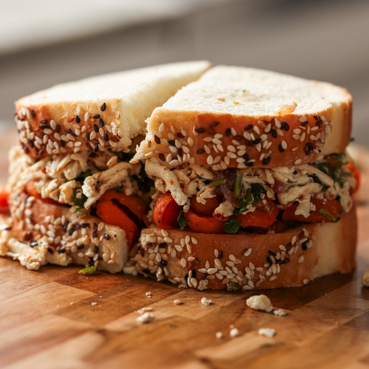 shredded tofu and roasted carrots sandwich after slicing