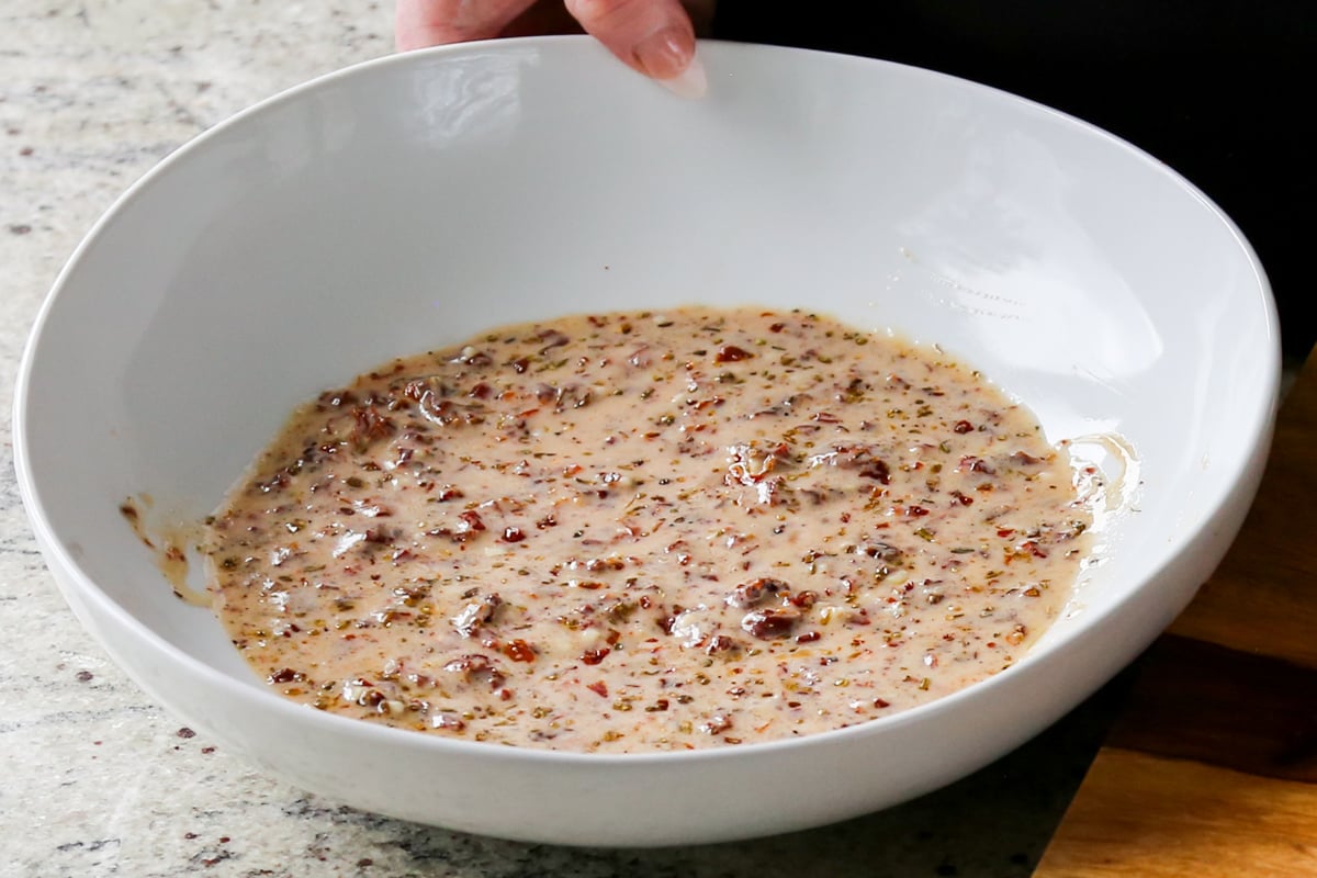 Italian dressing in the bowl, after mixing
