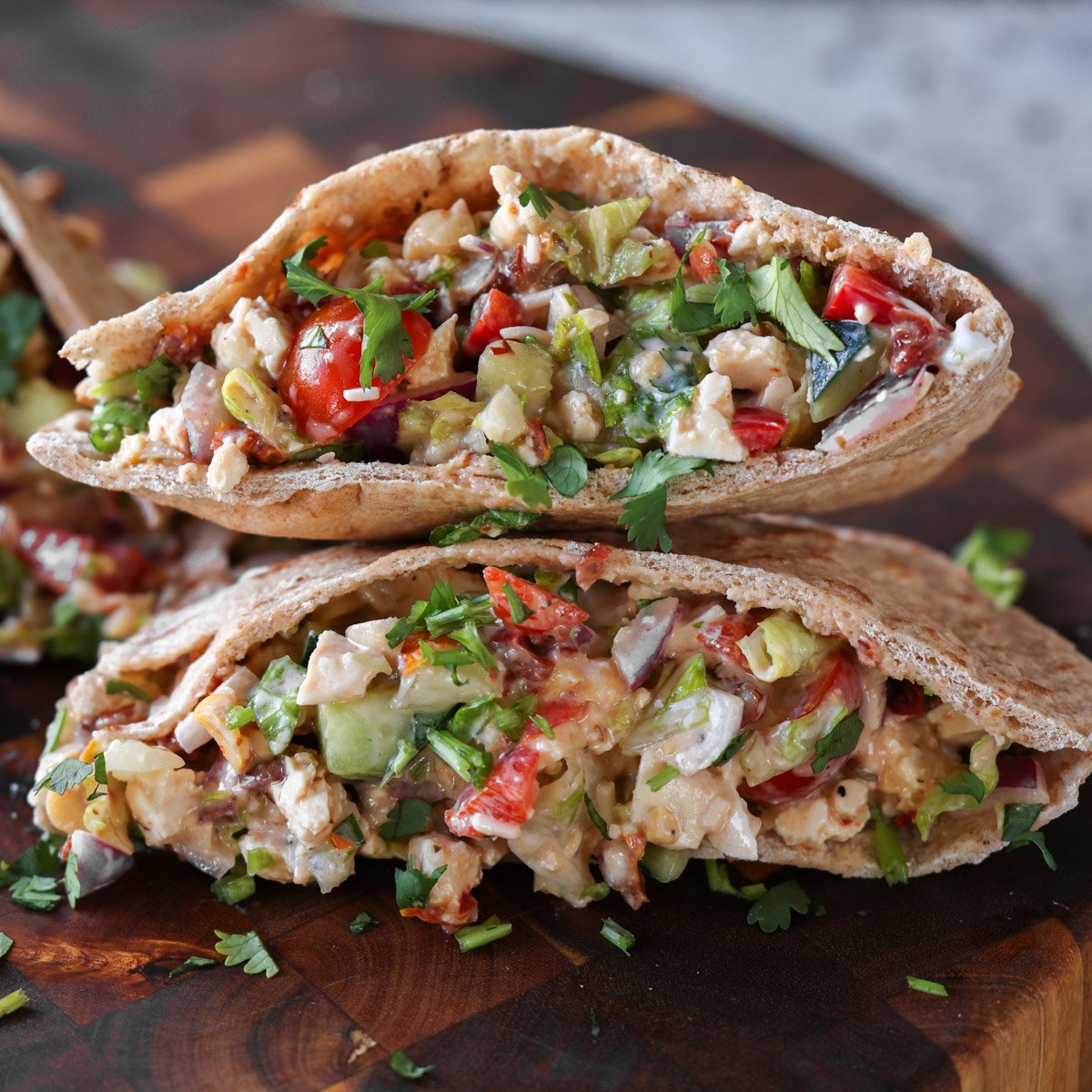 chopped Italian salad sandwich in a pita