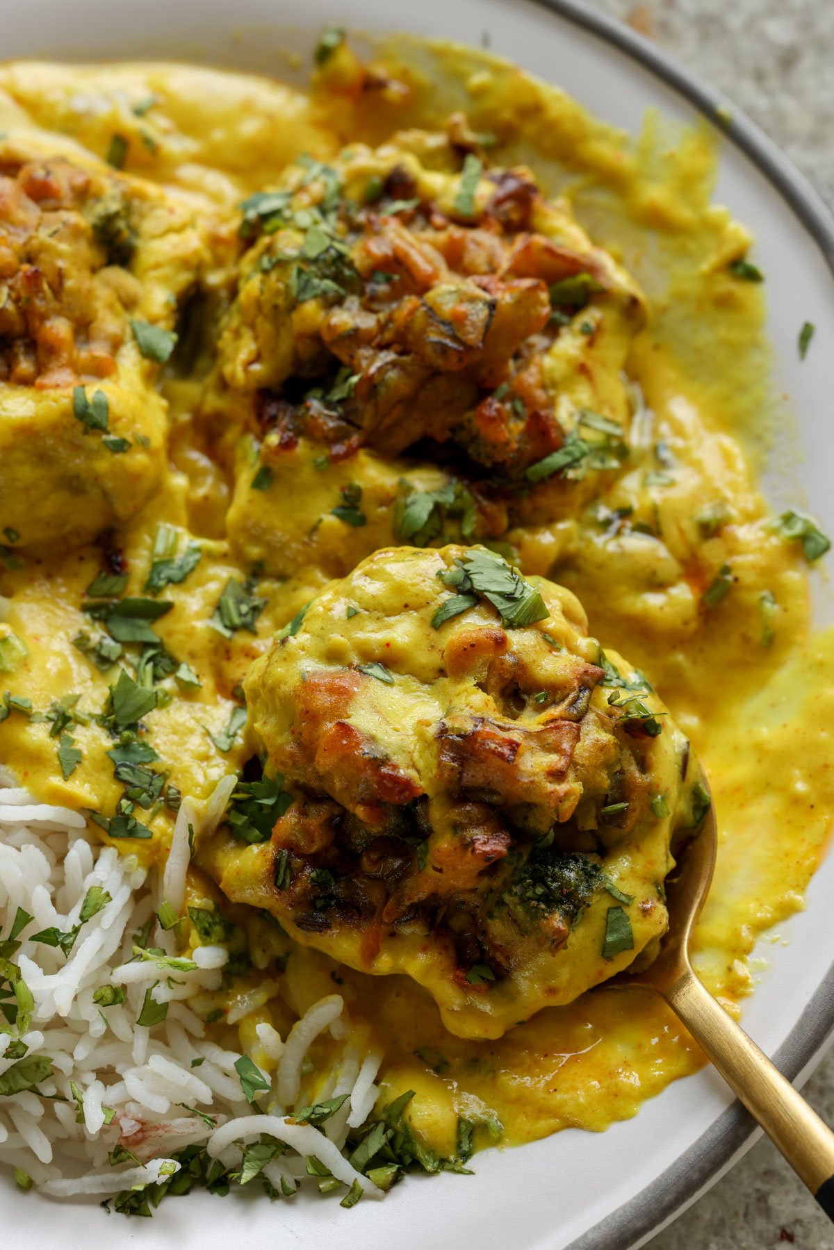 close up of a plate of kadhi pakora