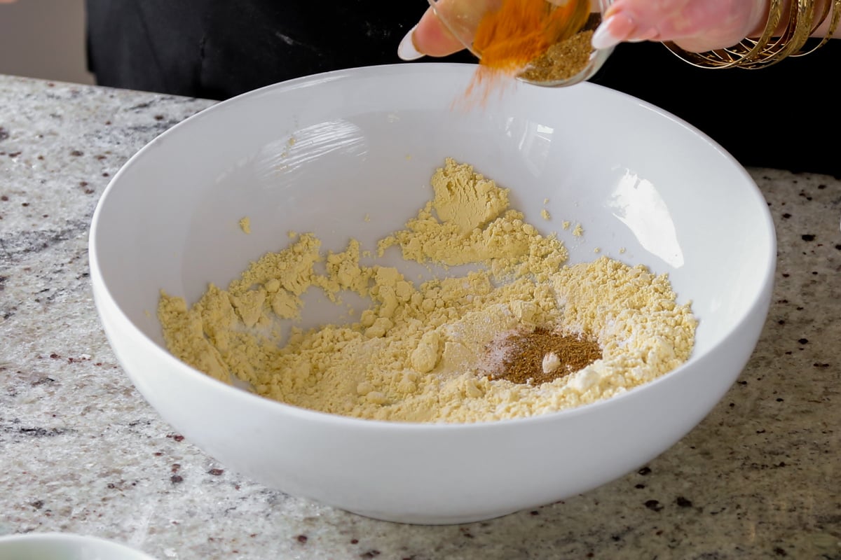 chickpea flour and spices in the bowl