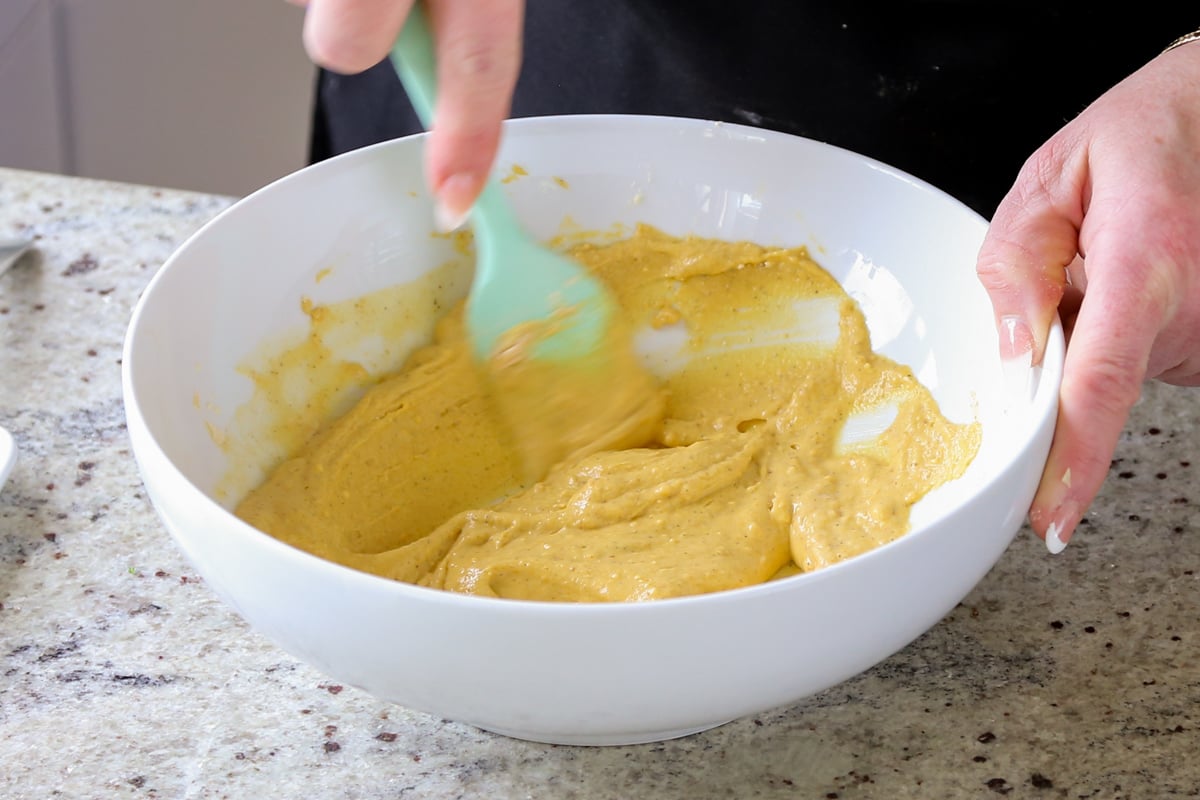 pakora batter in the bowl after mixing