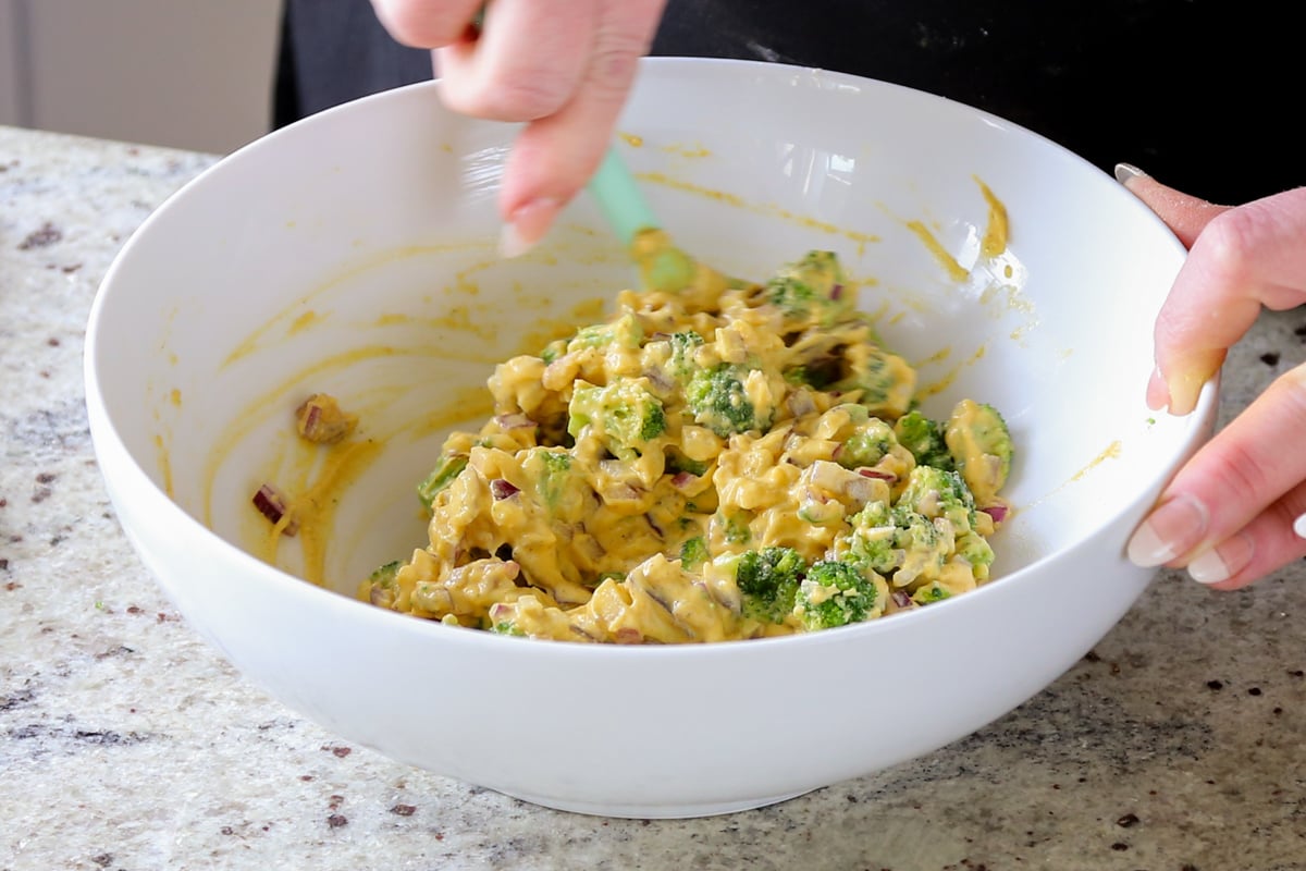 mixing the veggies into the pakora batter