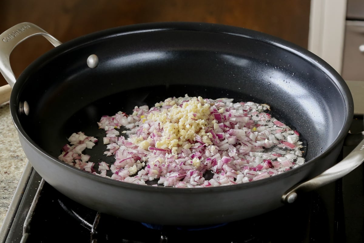 onion and garlic in the pan before cooking