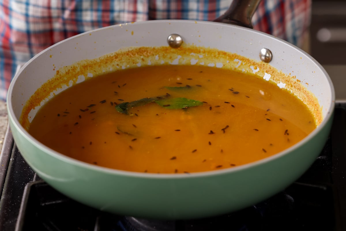 curry sauce in the pan before adding veggies and cooking