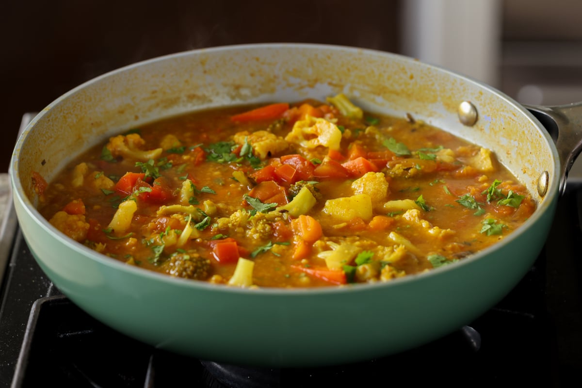 Sindhi kadhi in the pan after topping with cilantro