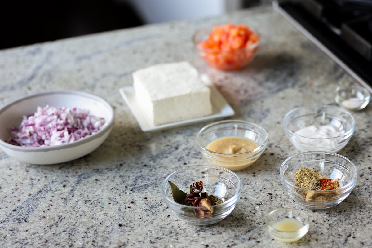 Chettinad pepper chicken curry ingredients on the kitchen counter