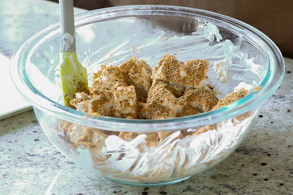 adding spice mix to the tofu