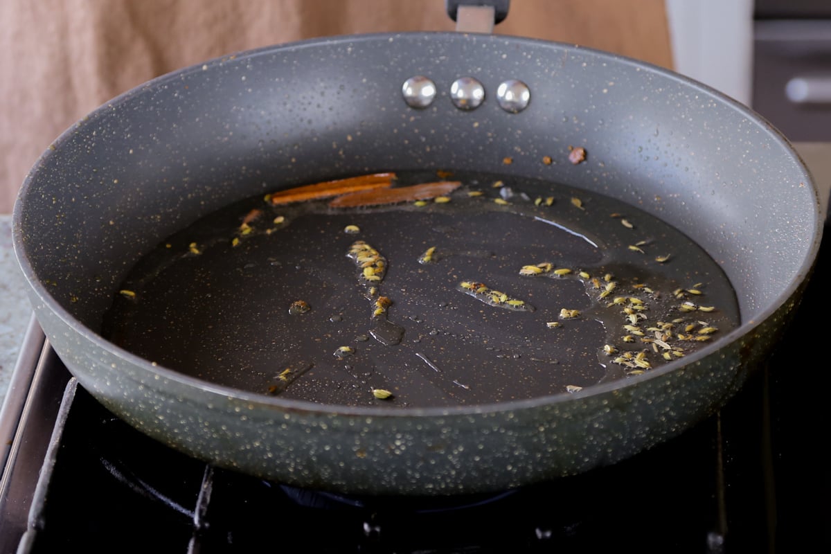 roasting the whole spices on the pan