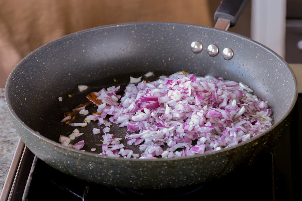 onion in the pan before cooking