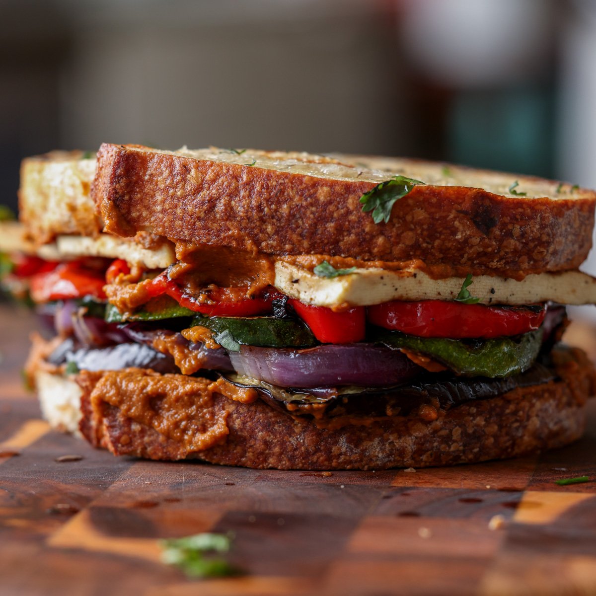grilled veggie sandwich on the cutting board