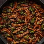vegan beef with broccoli in the pan after adding garnishes