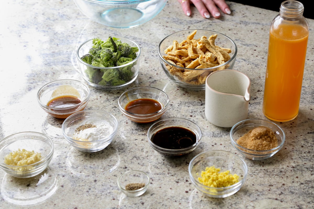 vegan beef with broccoli ingredients in bowls on the kitchen counter
