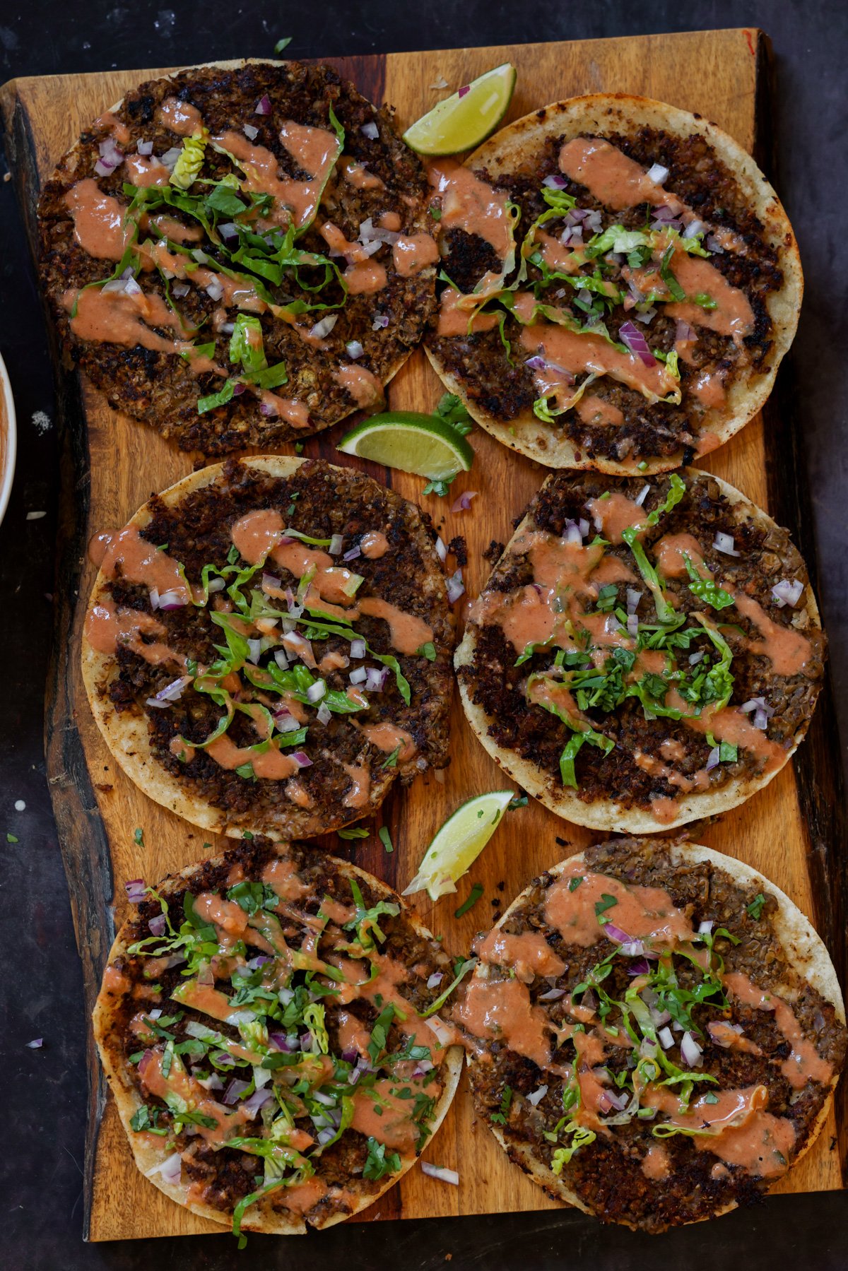 butter chicken smashed tacos on a serving tray