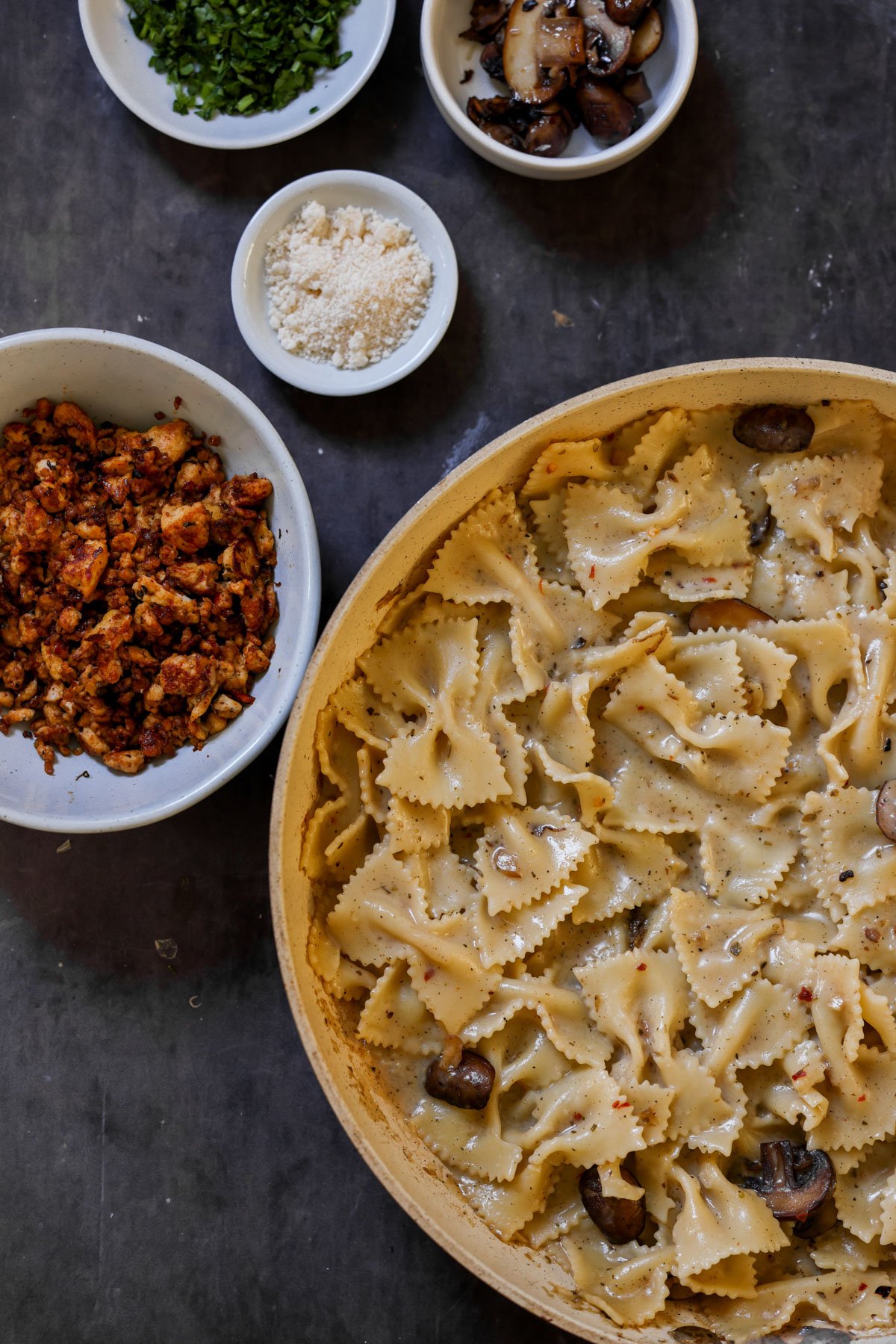 chili miso pasta with the tofu crumbles in a bowl on the side
