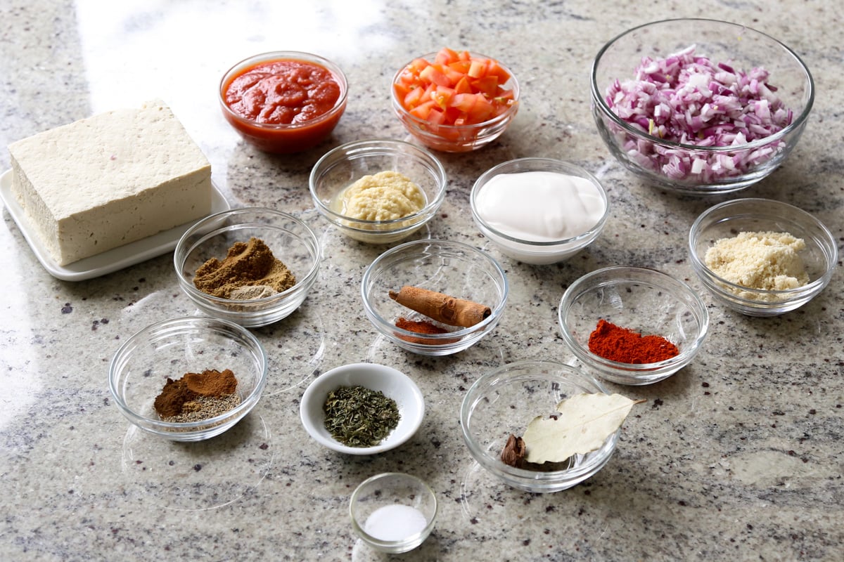 chicken angara ingredients in bowls on the kitchen counter