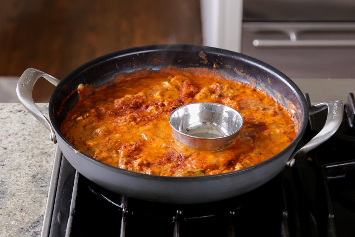 adding the ramekin to the pan