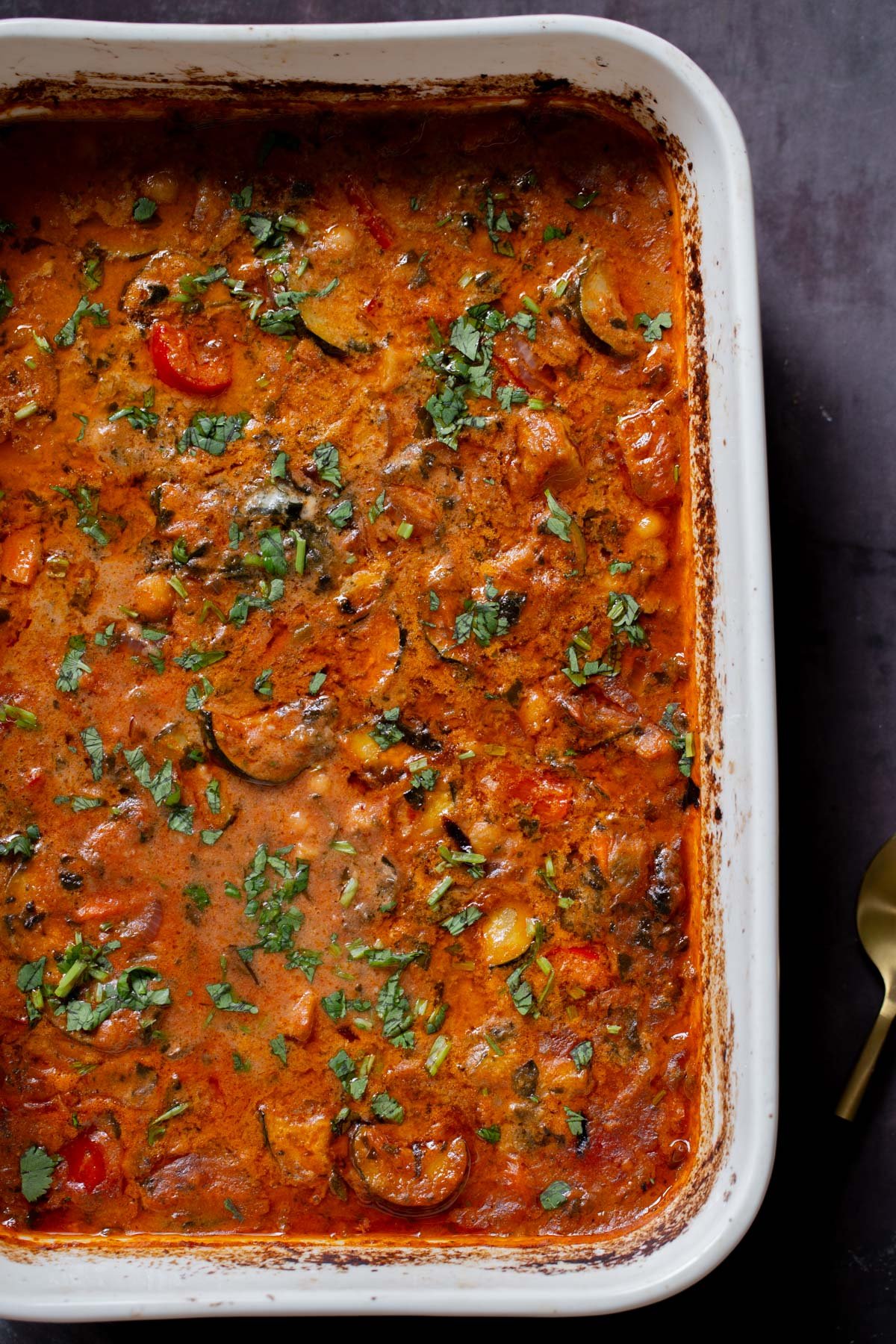 zucchini chickpea curry in the pan after baking