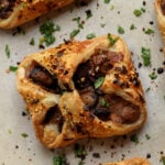 close-up of mushroom puffs on a baking sheet