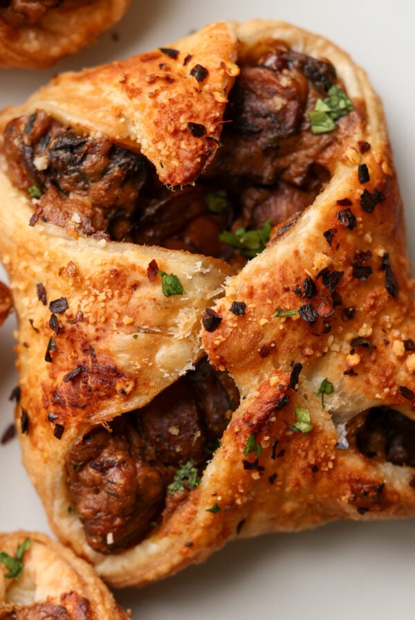 close-up of mushroom puffs on a white serving plate