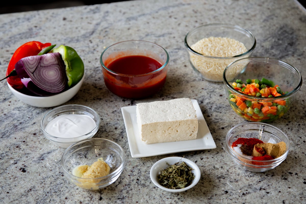 tikka masala rice bake ingredients on the kitchen counter