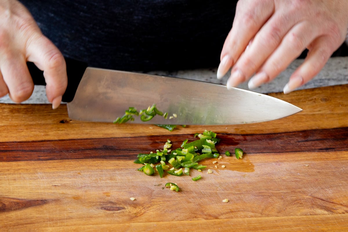 chopping a green chili