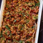 tikka masala rice in the baking pan after baking and fluffing