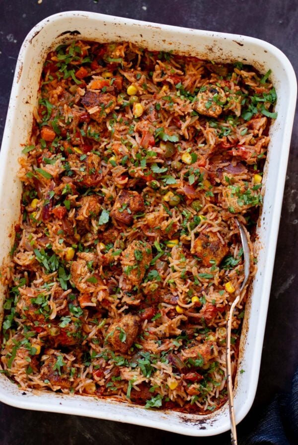tikka masala rice in the baking pan after baking and fluffing
