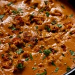 close-up of restaurant-style butter chicken in the pan