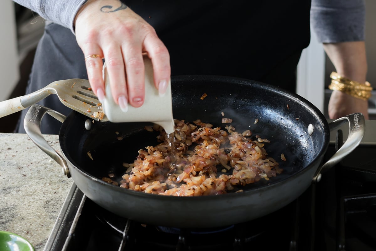 adding water to the onion