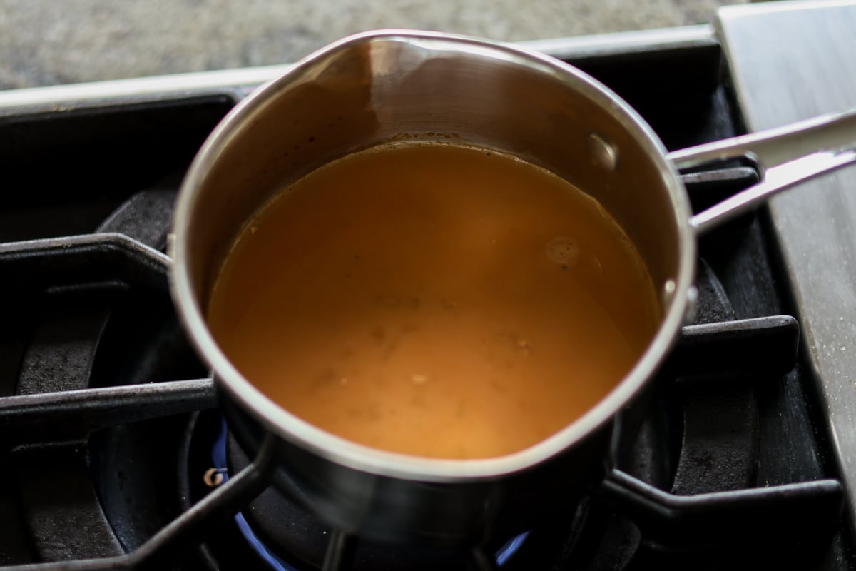 chai in the pan after adding milk