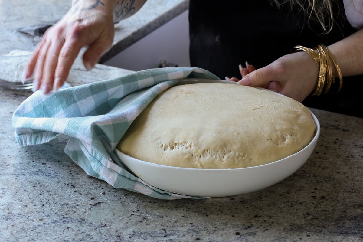 dough in the bowl after rising