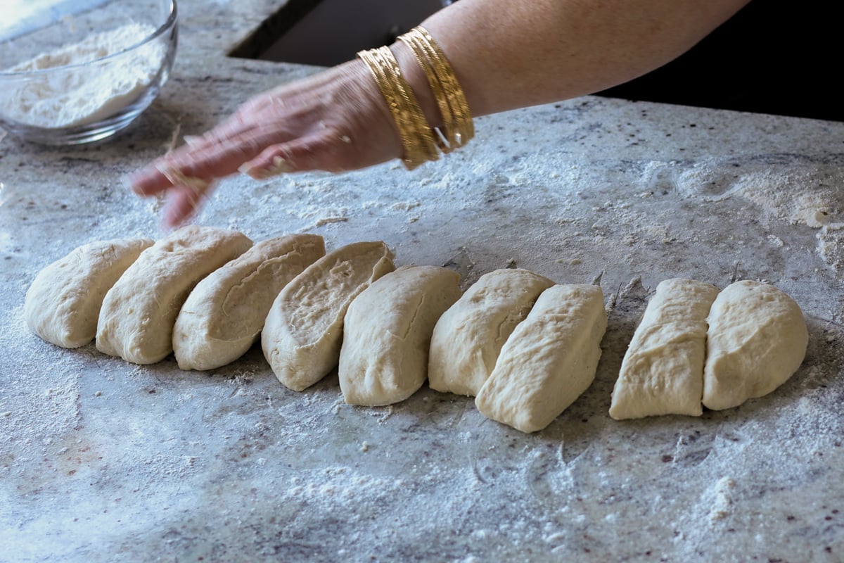 dough cut into dinner roll size pieces