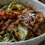 close-up of bowl of creamy tahini ramen with teriyaki tofu on top