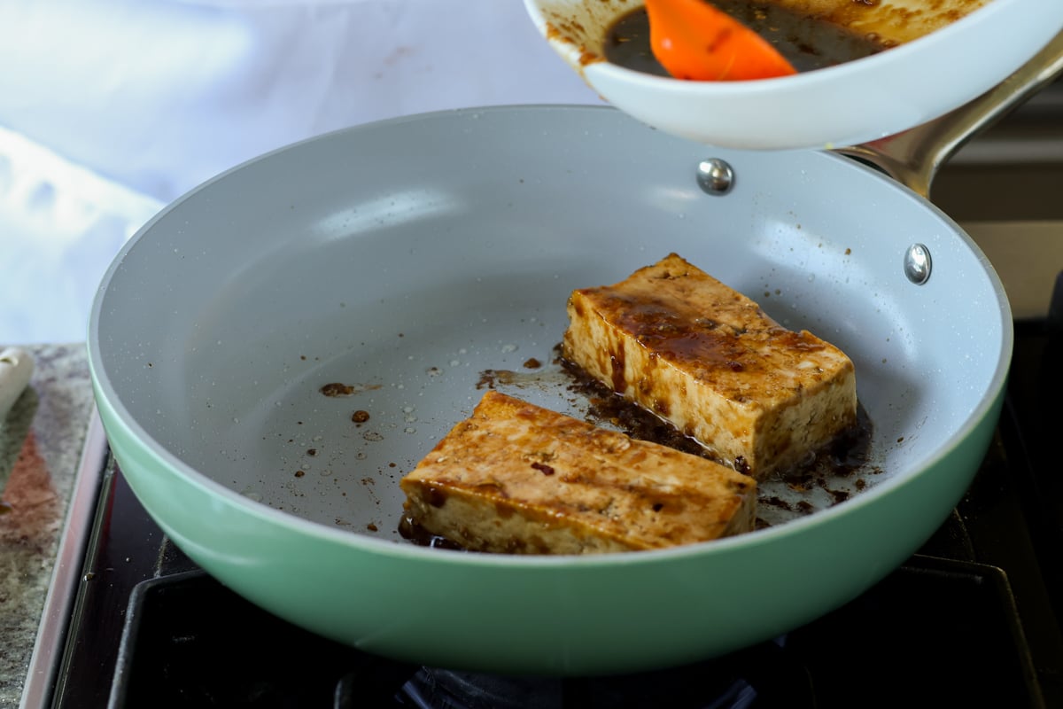 teriyaki tofu in the pan after flipping