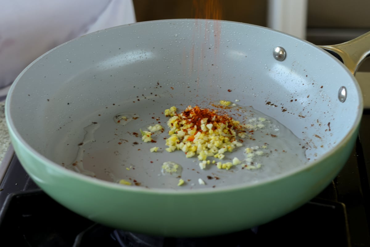 chili crisp ingredients in the pan