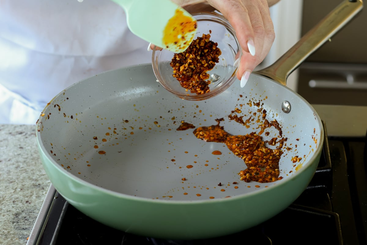 reserving half of the cooked chili crisp