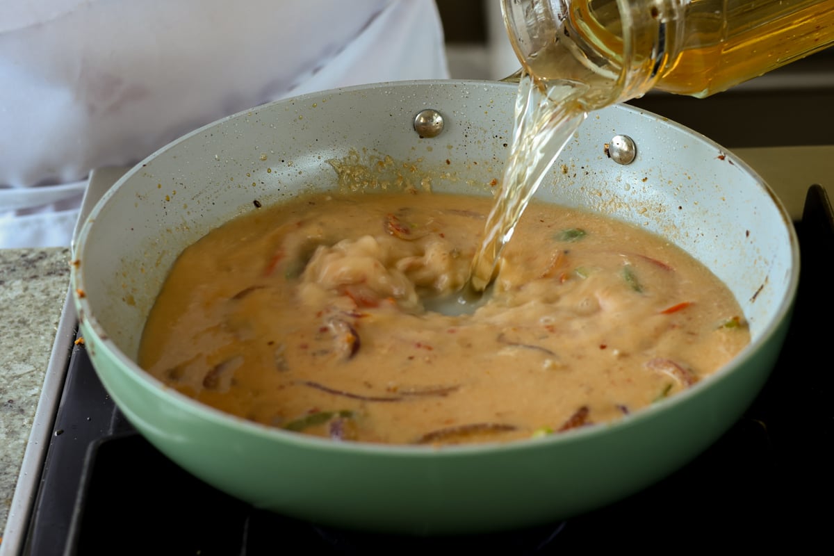 adding remaining stock to the tahini miso broth