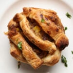 mini pot pie with a simple crust on a plate