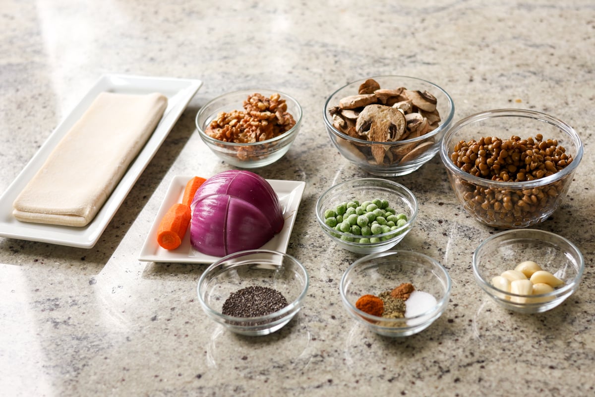 lentil Wellington ingredients in bowls on the kitchen counter